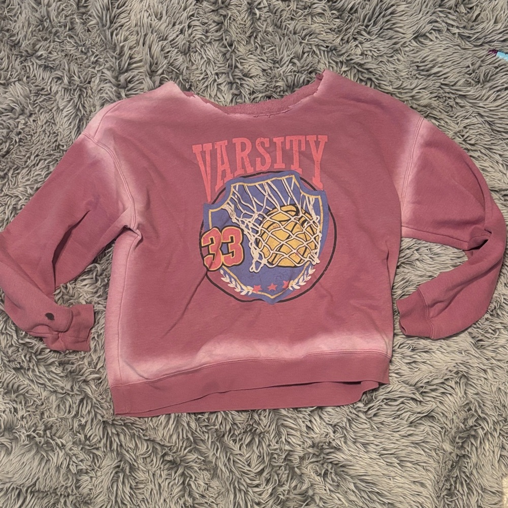 Wild Fable’s Pink Off-The-Shoulder Varsity Graphic Sweatshirt